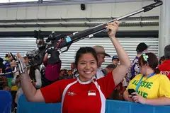 SRIKANDI NEGARA: Penembak muda Singapura, Martina Veloso, meraikan emas keduanya di Sukan Komanwel ini semalam. - Foto AFP