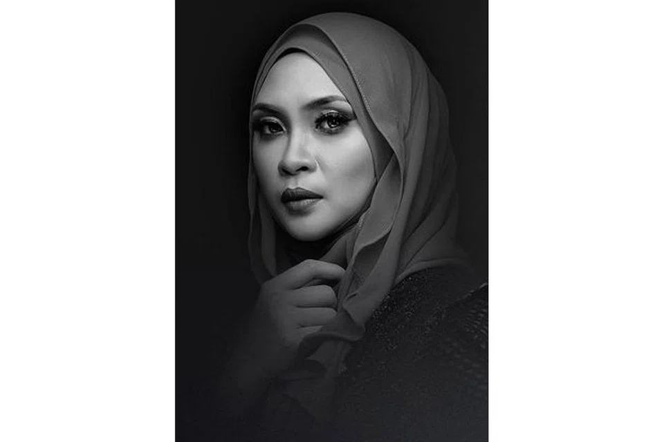 SITI NORDIANA: Pernah mendirikan rumah tangga dengan pelakon Allahyarham Faizal Yusof pada 2006, namun bercerai tiga tahun kemudian. - Foto RAKSASA RECORDS
