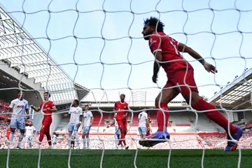 LIGA PERDANA ENGLAND: Penyerang Liverpool, Mohamed Salah, gembira selepas memasukkan gol ketiga pasukannya dalam perlawanan bola sepak bersama Aston Villa di Anfield pada 3 September.