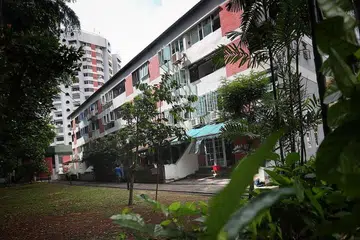 KEMUDAHAN UNTUK PEKERJA ASING: Bekas bangunan kediaman Chancery Court akan menempatkan pekerja asing yang sihat dalam perkhidmatan penting, sementara tempat letak kereta bertingkat dan terbuka di Singapore Racecourse akan menempatkan pekerja yang pulih.