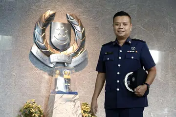 LAMA BERBAKTI: Supt Rimyzad merupakan antara pegawai Home Team yang menerima Pingat Perkhidmatan Lama di bawah Anugerah Hari Kebangsaan Kementerian Ehwal Dalam Negeri (MHA). - Foto ZAOBAO