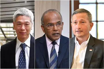 Awal dari ini, Encik Lee Hsien Yang (kiri), berdepan saman fitnah di mahkamah yang dikemukakan oleh Menteri Ehwal Dalam Negeri merangkap Undang-Undang, Encik K. Shanmugam (tengah); dan Menteri Ehwal Luar, Dr Vivian Balakrishnan (kanan), kerana memfitnah mereka mengenai penyewaan dua banglo di Ridout Road.