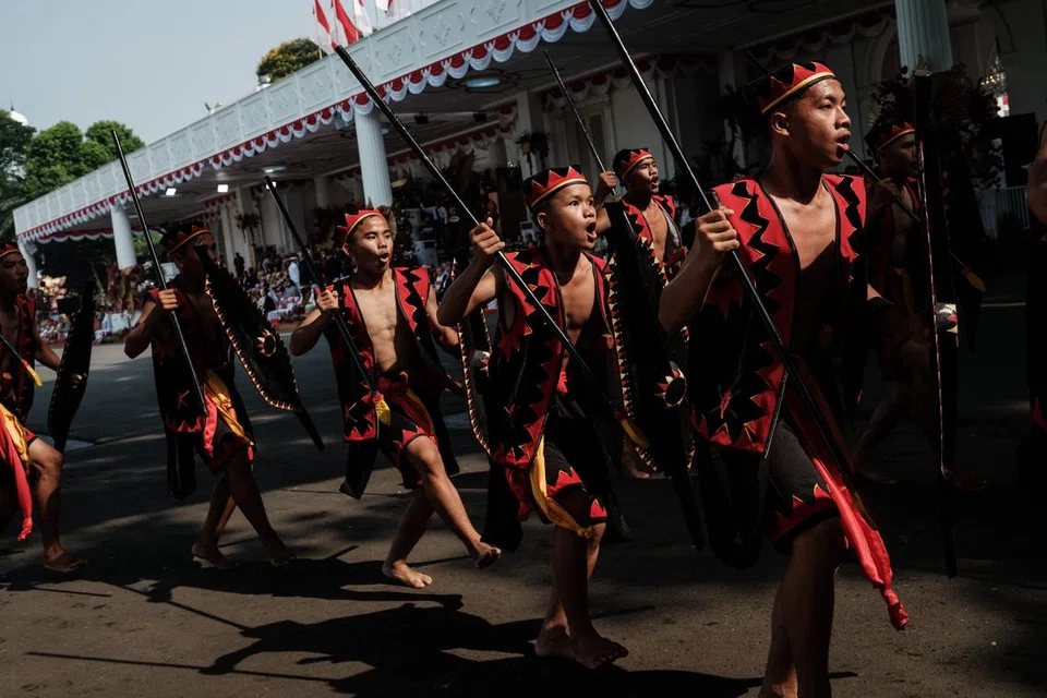 SAMBUTAN MERIAH: Para peserta yang mengambil bahagian dalam upacara memperingati Hari Kemerdekaan Indonesia ke-78 di Istana Presiden di Jakarta pada Khamis.