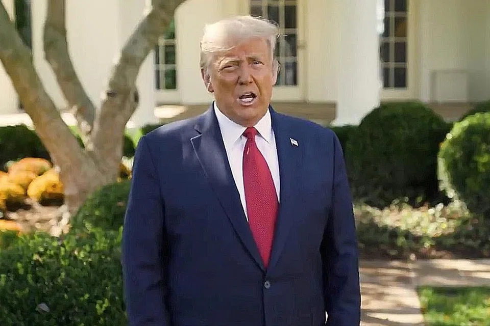 KEMBALI BERTUGAS: Presiden Amerika Syarikat, Encik Donald Trump, menemui media di Rumah Putih kelmarin dan menyatakan keadaan dirinya bertambah baik selepas dijangkiti Covid-19 minggu lalu. - Foto REUTERS