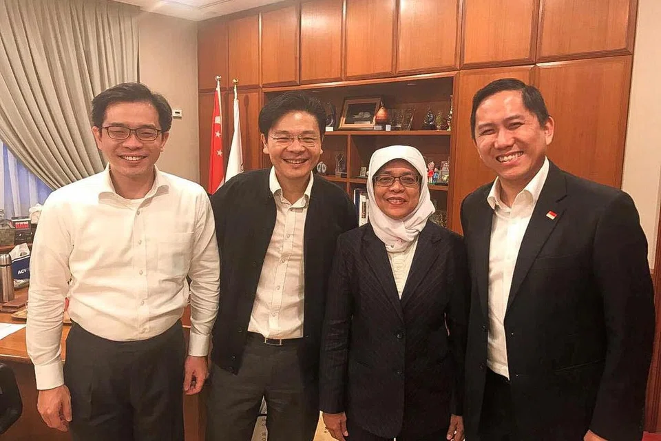 KENANGAN: Gambar yang dipetik pada 2017 ini menunjukkan pasukan Parti Tindakan Rakyat (PAP) yang memenangi GRC Marsiling-Yew Tee pada pilihan raya umum 2015 - (dari kiri) Encik Ong Teng Koon, Encik Lawrence Wong, Puan Halimah Yacob dan Encik Alex Yam.