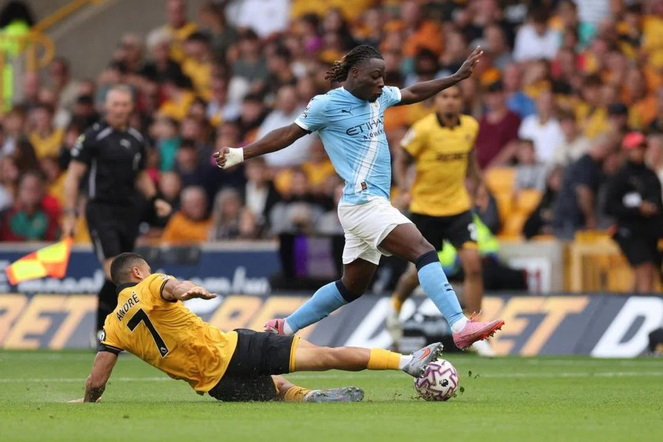 Andre, Wolverhampton Wanderers, Manchester City, Jeremy Doku