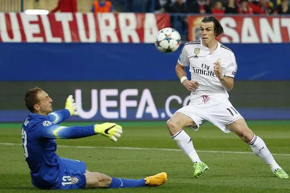CEMERLANG: Penjaga gawang Atletico Jan Oblak bertindak cemerlang, menyelamatkan percubaan Bale di awal perlawanan. 