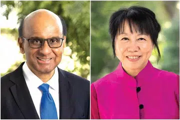 SUDAH SIAP: Potret rasmi Presiden Tharman Shanmugaratnam dan isterinya, Cik Jane Ittogi, akan siap untuk diambil antara 8 Januari hingga 1 Mac ini untuk digantung di tempat awam seperti sekolah dan bangunan pemerintah.