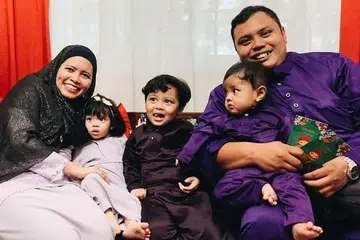 TERIMA REALITI: Cik Siti Nurlia bersama suami, Encik Muhammad Haiqal dan anak-anak mereka pada Hari Raya. - Foto ihsan SITI NURLIA SUBARI