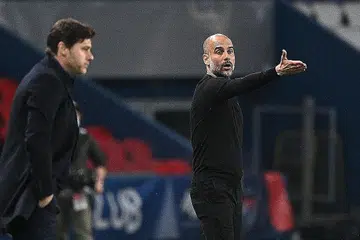 NASIB BERBEZA: Pengurus PSG Mauricio Pochettino dan - Pengurus City Pep Guardiola. - Foto AFP
