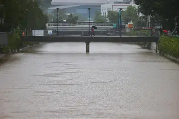 Paras air yang tinggi kelihatan di longkang besar Sungai Pandan Kechil akibat hujan lebat pada 14 Oktober.