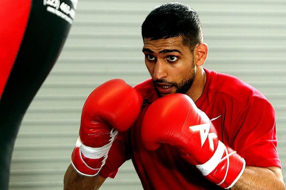 AMIR KHAN: Seperti Pacquiao beliau juga tidak mendedahkan lokasi perlawanan mereka. - Foto fail