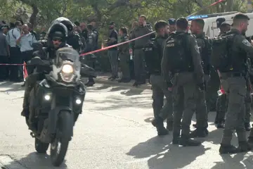 AKSI TEMBAKAN: Pasukan tentera Israel tiba di tempat kejadian tembakan di perkampungan Yahudi di Maale Adumim, Tebing Barat, pada Selasa. 