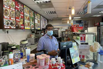 HARAP PELANCONG KEMBALI: Encik Abdul Malik berkata kedainya, Coffee and Snacks Temptation di Terminal Feri Tanah Merah terjejas teruk tanpa pelancong. Beliau memutuskan untuk membuka satu lagi kedai serupa di Shenton Way untuk membantu perniagannya. - Foto BH oleh SITI AISYAH NORDIN 
