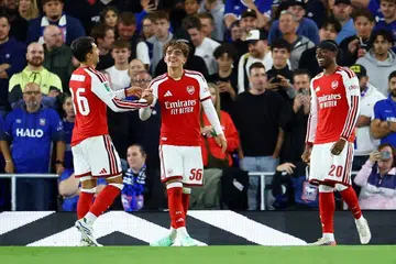 Pemain Arsenal, Max Dowman (tengah) meraikan gol ketiga jaringanya bersama Noni Madueke (kanan) dan Martin Zubimendi dalam perlawanan pusingan ketiga Piala Carabao menentang Ipswich Town, di Stadium Portman Road, pada 15 September.