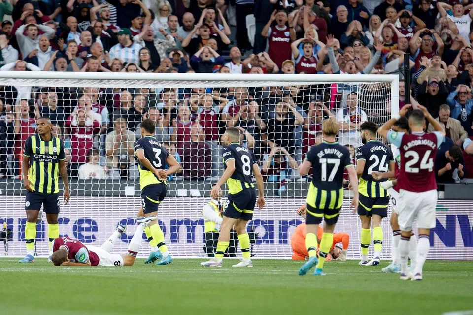 Perbicaraan kes Manchester City (pemain mengenakan jersi berbelang) yang dikenakan pertuduhan pada 2023 atas 115 dakwaan pelanggaran peraturan kewangan, dijangka bermula pada Oktober.