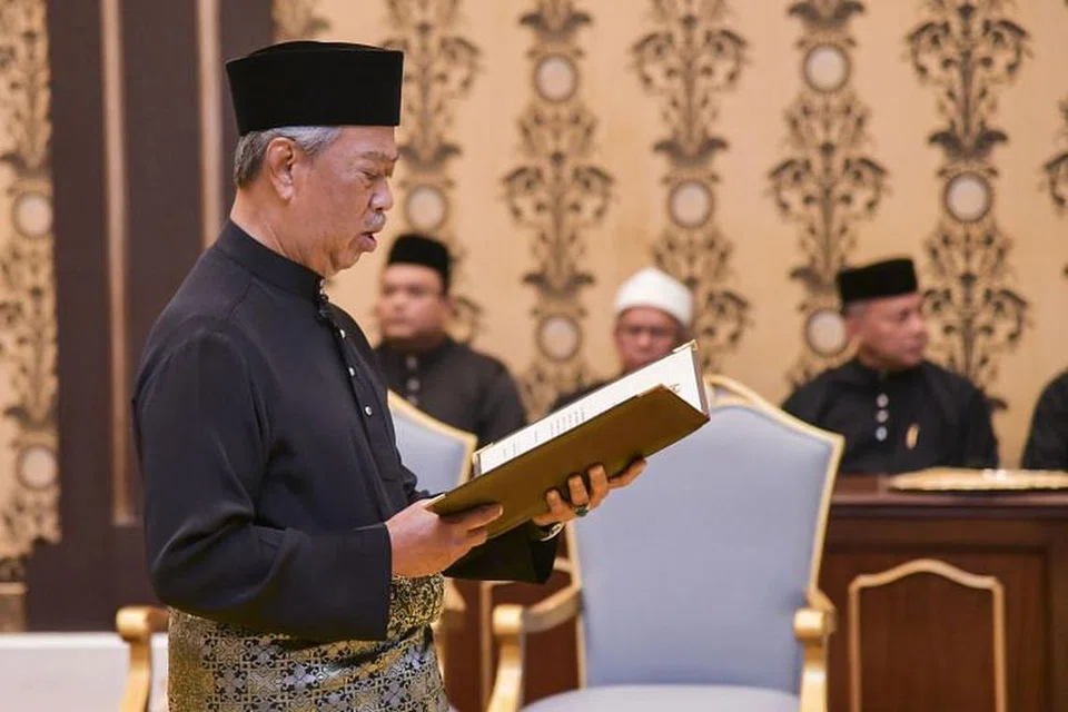 ANGKAT SUMPAH: Tan Sri Muhyiddin Yassin sebelum ini mengangkat sumpah sebagai Perdana Menteri di Istana Negara pada 1 Mac 2020.