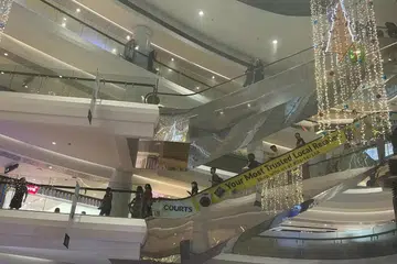 BERKABUT: Asap kelihatan keluar dari X-Craft, kedai fesyen jalanan di tingkat empat Tampines Mall pada 27 Disember.