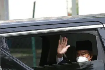 MENGHADAP AGONG: Kenderaan membawa Perdana Menteri, Tan Sri Muhyiddin Yassin meninggalkan kediaman beliau di Bukit Damansara menuju ke Istana Negara. - Foto NSTP