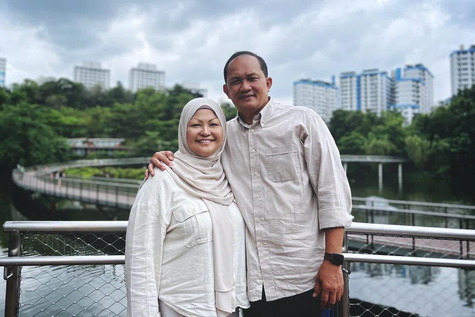 Encik Azmi Said bersama isterinya, Cik Suriyati Zain, 53 tahun.