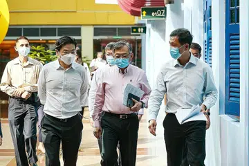 HADIRI SIDANG MEDIA MTF:(Dari kiri) Pengerusi bersama MTF - Timbalan Perdana Menteri, Encik Lawrence Wong; Menteri Perdagangan dan Perusahaan, Encik Gan Kim Yong dan Menteri Kesihatan, Encik Ong Ye Kung. - Foto CMG
