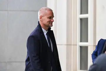 Mantan ketua operasi Goldman Sachs di Asia Tenggara, Timothy Leissner, tiba di Mahkamah Daerah Timur New York, Amerika Syarikat, pada 29 Mei.