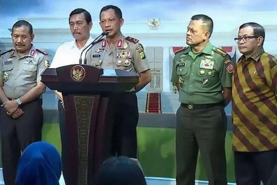 Jeneral Tito Karnavian (tengah) bercakap kepada wartawan di Pejabat Presiden. PHOTO: THE JAKARTA POST / ASIA NEWS NETWORK