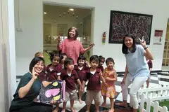 PERMINTAAN TINGGI: Cik Jummaida (tengah)bersama kanak-kanak dan guru di Oddysey The Global Preschool di Still Road. Walaupun yuran tajaka itu $2,300 sebulan, ia mendapat permintaan tinggi daripada warga Singapura dan ekspatriat.