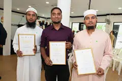 (Dari kiri) Encik Ali Md Ashik, Encik Hossain Nazir dan Encik Khandakar Suman adalah antara lebih 80 pekerja migran beragama Islam yang menerima Sijil Penghargaan semasa sambutan Hari Raya dan Majlis Penghargaan Imam pada 21 April di Pusat Rekreasi (RC) Sembawang.