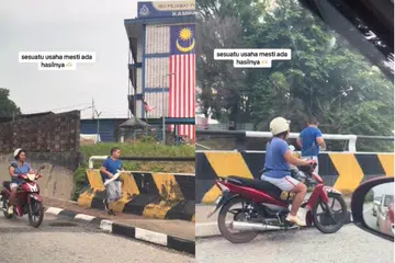 KASIH IBU: Seorang wanita memegang rotan di tangan kiri sambil mengekori seorang lelaki yang dipercayai anaknya, berlari-lari anak.