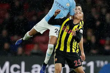 PENUH AKSI: Royad Mahrez (kiri), yang cuba merebut bola daripada Jose Holebas, cemerlang bermain buat Manchester City dalam kemenangan pasukannya ke atas Watford. - Foto REUTERS