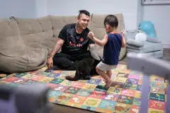 Bekas pesalah, Encik Musa Abdul Rahim, yang dibebaskan pada 2019, telah menerima sokongan New Life Stories (NLS) semasa berada dalam penjara. Gambar menunjukkan beliau bersama anak lelakinya, Nur Adam, dua tahun, di rumahnya di Yishun pada 14 Januari.