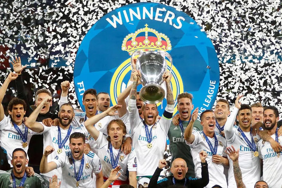 Real Madrid meraikan kemenangan mereka tahun lalu. Foto: REUTERS