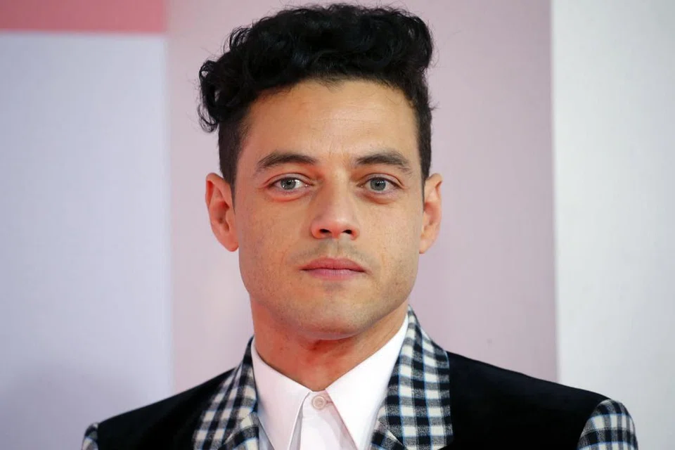 Rami Malek (gambar atas). - Foto ALEX BAILEY 