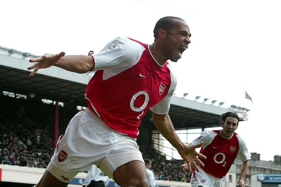 HENRY: Arsenal kekal sebagai satu-satunya kelab yang tidak pernah tewas pada musim 2003-2004, dengan Henry berperanan sebagai antara pemain tunggaknya. 