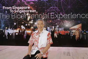 HARAPAN TAHUN BARU: Menurut Encik Lee, meskipun pertumbuhan ekonomi dunia yang lebih perlahan sudahpun menjejas negara ini namun tahun ini, Singapura berjaya mengelakkan kemelesetan ekonomi. - Foto MCI