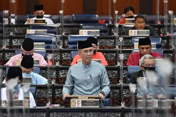 MASIH TANDA TANYA: Menteri Kewangan, Datuk Seri Tengku Zafrul Tengku Abdul Aziz, membentangkan Belanjawan 2021 Malaysia Khamis lalu. Sama ada para AP akan menyokong belajawan itu untuk diluluskan masih menjadi tanda tanya. - Foto JABATAN PENERANGAN MALAYSIA