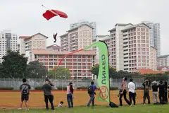 BUAT PERSEMBAHAN: Pasukan Red Lions semalam berlatih di tanah lapang dekat Junction 8 di Bishan. - Foto BH oleh ONG WEE JIN
