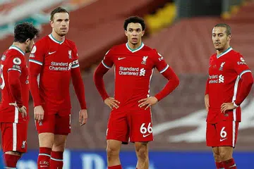 KECEWA: Para pemain Liverpool kelihatan amat kecewa selepas dibolosi gol oleh Brighton dalam persaingan di Anfield, Liverpool, semalam. - Foto REUTERS