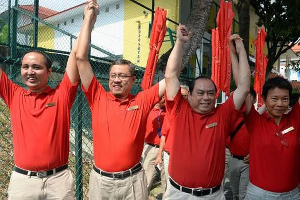 PASUKAN SDP MARSILING- YEW TEE: (Dari kiri) Encik Bryan Lim, Encik Damanhuri Abas, Encik John Tan dan Cik Wong Souk Yee. - Foto THE STRAITS TIMES