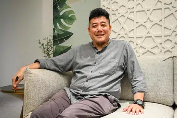 TERUS BERKHIDMAT: Hassan Salleh kini menjawat tugas sebagai Ketua Pemasaran dan Perhubungan (Marcomm) Jamiyah Singapura.