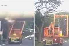Muatan treler itu terlanggar bahagian bawah jejambat PIE, menyebabkan sebahagiannya terlepas dari kenderaan.