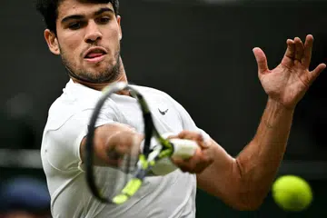 Pemain tenis Sepanyol, Carlos Alcaraz, gembira meraikan kemenangannya menentang ,Tommy Paul, dari Amerika Syarikat, dalam perlawanan suku akhir perseorangan lelaki pada hari kesembilan Kejohanan Wimbledon 2024 di, ‘The All England Lawn Tennis and Croquet Club’ di Wimbledon, London, pada 9 Julai.