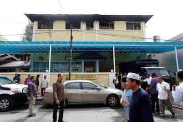 KEBAKARAN RAGUT NYAWA: Gambar fail pada September 2017 selepas kebakaran di Pusat Tahfiz Darul Quran Ittifaqiyah dekat Kuala Lumpur menelan jiwa 23 pelajar dan guru. - Foto REUTERS