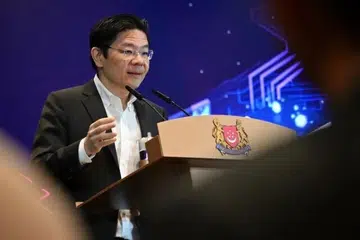 Perdana Menteri, Encik  Lawrence Wong, ketika berucap pada Sidang Kemuncak SkillsFuture untuk Perniagaan di Institut Pembelajaran Sepanjang Hayat (LLI) pada 16 September.