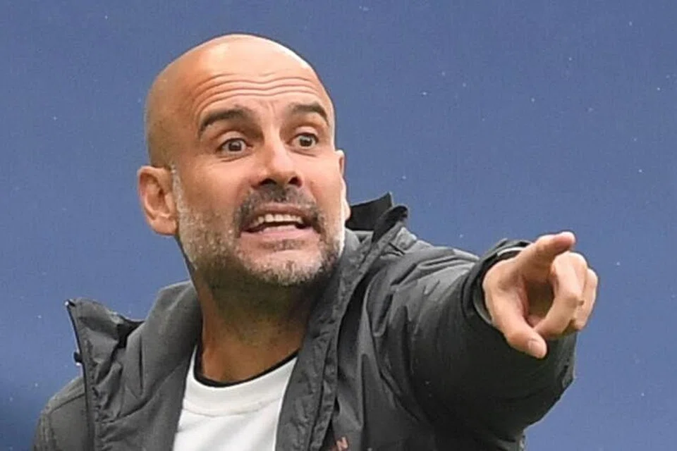 SAMBUNG KONTRAK: Pengurus Manchester City Pep Guardiola telah menandatangani kontrak baru dua tahun bersama kelab tersebut yang akan mengikat beliau sehingga akhir musim 2022-23. - Foto AFP