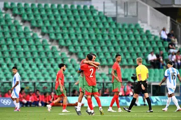 Kapten Maghribi, Achraf Hakimi, meraikan kemenangan 2-1 pasukannya ke atas Argentina dalam  stadium yang sudah dikosongkan pada perlawanan pembukaan bola sepak Paris 2024 pada 24 Julai. 
