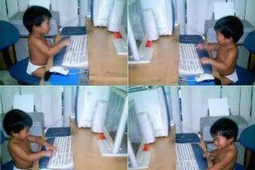 Encik Muhd Nur Haziq ketika masih bayi sudah berjinak-jinak bermain komputer di rumah datuknya.