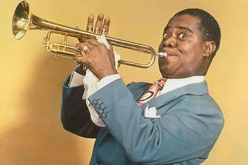 LOUIS ARMSTRONG: 'What A Wonderful World' dendangannya hanya popular pada 1988, 20 tahun selepas dihasillkan pada 1968, kerana Robin Williams menggunakannya bagi filem 'Good Morning, Vietnam'. - Foto NEW YORK DAILY NEWS 