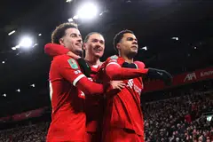GOL KEMENANGAN: Pemain sayap Cody Gakpo (kanan) meraikan golnya bersama Curtis Jones (kiri) dan Darwin Nunez (tengah), yang meletakkan Liverpool di hadapan 2-1 ketika menentang Fulham dalam pusingan pertama separuh akhir Piala Liga di Anfield pada 11 Januari.